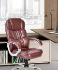 Ergonomic High Back Office Chair With PU Leather Adjustable Desk Chair Swivel Task Chair in brown by a modern office desk