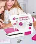 Kids Sewing Machine Toy with Realistic Pedal and Needle Threading, pink and white, with protective guard and accessories.