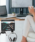 Under Desk Laptop Mount And Side Hanging File Organizer with computer and accessories near a desk and person drinking coffee.