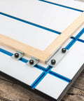 Intersections Kit for T Track Systems, showing dual T track intersections with predrilled mounting holes on a wooden workbench surface.