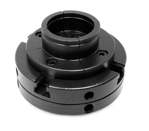 4-jaw self-centering lathe chuck, black metal, front view