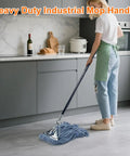 Damn Near Indestructible 60 Inch Heavy Duty Metal Mop Handles 2 Pack Gritty Commercial Workhorse Mop Sticks in use on tile floor.