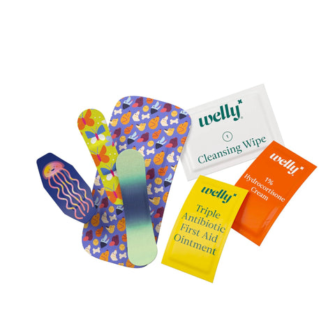 Welly 70-count first aid front view: fabric bandages, cleansing wipe, triple antibiotic ointment, hydrocortisone cream.