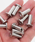 Stainless Steel Cable Railing Protector Sleeves Kit Fits 3/16 Inch Wire Rope Sturdy Weather Resistant Sleeves For Wood Posts Decking Projects close-up in hand