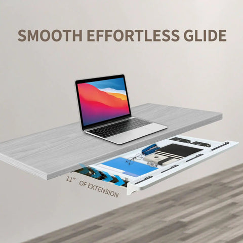 Under Desk Sliding Drawer With Smooth Ball Bearing Rails For Sit Stand Tabletops showing white organizer under desk with laptop and office supplies.