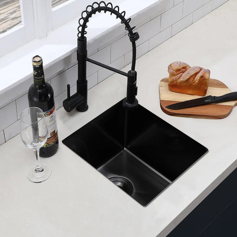 Black Undermount Bar Sink 15x17 Inch For RVs And Small Kitchens, Stainless Steel Wet Bar Sink With 18 Gauge T304 Construction shown in kitchen