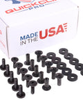 Black Half Inch Chicago Screws With Rubber Washers Kickass Flat Head Through Hole Fasteners for DIY projects arranged on a surface.