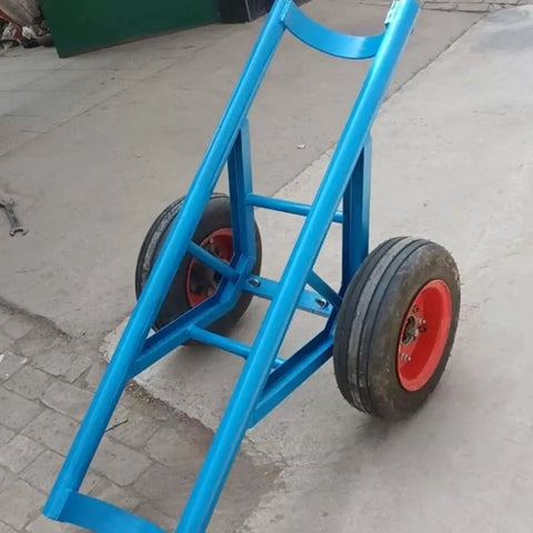 Tough As Nails Heavy Duty Pole Hauler Cart For Concrete Utility Lines And Long Material Transport With Swivel Casters And Bulletproof Steel Chassis Assembly, side view with blue frame and red wheels.