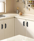 Black Barn Door Handle Set Two Pack Aluminum Alloy Punch Free Sliding Handles installed on white kitchen cabinets.