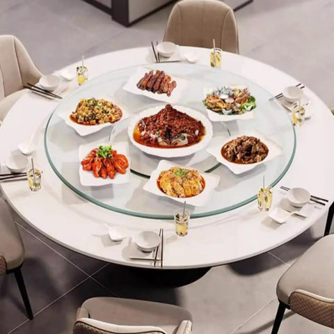 Big Boy Sized Round Lazy Susan With Dead Silent Glide 360 Degree Rotation Serving Tray featuring various dishes on a round glass table.