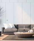 Stylish living room with 7 Day Programmable Thermostat With Backlit Digital Display And Precise Temperature Control on wall