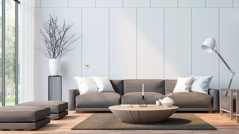 Stylish living room with 7 Day Programmable Thermostat With Backlit Digital Display And Precise Temperature Control on wall