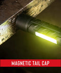 Polysteel 700 LED Flashlight 800 Lumens showing magnetic tail cap attached to metal surface for hands-free use
