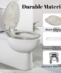 Elongated Concrete polished abstract silver grey grunge Toilet Seat shown on a white toilet with open lid and stainless steel hinges.