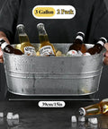 Person holding Two Pack Galvanized Tub Ice Buckets Set Of Two Large Metal Beverage Buckets With Carry Handles For Parties
