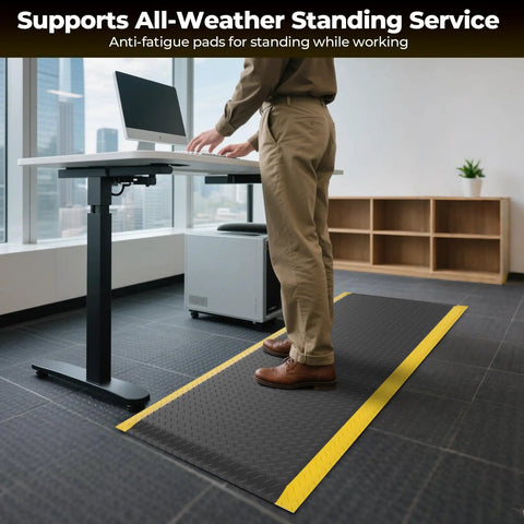Man standing on Ergonomic Anti Fatigue Mat for Workshop 84 by 35 inches cushioned memory foam anti-slip in office setting
