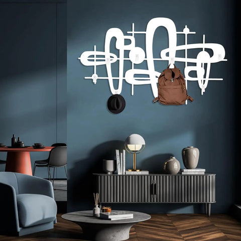 Slick Mid Century Metal Coat Rack With Abstract Wall Hooks Top Shelf Luxury Entryway Decor showcasing brown backpack and hat on wall.