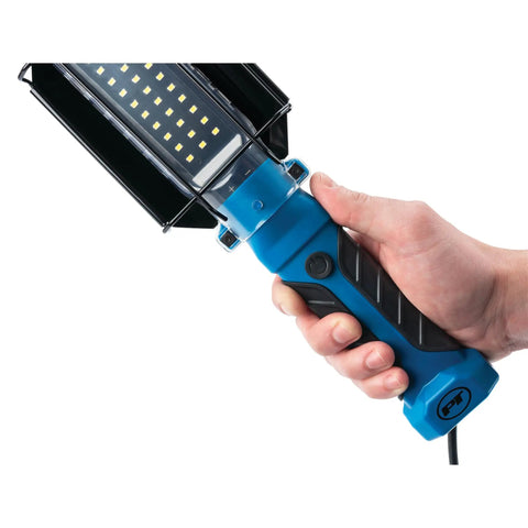 Hand holding 1000 Lumen LED Drop Light With Built In 120V Outlet, 25 Foot 18 Gauge Grounded Cord, Rugged Pro Grade Work Light