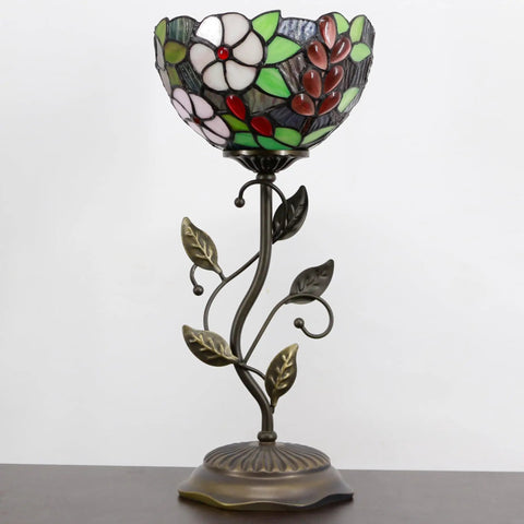 Small Tiffany Stained Glass Table Lamp With Uplight Accent, brown grape style desk light on metal leaf base in home setting