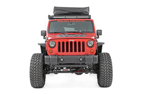 Front view of Jeep Wrangler JK 2007-2018 with Front Bumper Caps For Jeep Wrangler JK 2007 2018 Rock Crawler Stubby Conversion Nylon Caps Improve Approach Angles Eliminate Eleven Point Five Inches Per Side Easy Install With Lifetime Replacement installed.