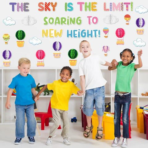 Children in classroom with 3D Hot Air Balloon Honeycomb Bulletin Board Set for Classroom Decor with Colorful Balloon Cutouts and Cloud Shapes
