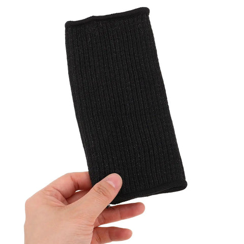 Tough As Nails Cut Resistant Arm Sleeves For Welding And Gardening Abrasion Guard heavy duty black synthetic fiber sleeve held in hand.