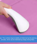 Person ironing Light Blocking Classroom Curtains 10W X 40H Blackout Roller Blinds For Windows And Door Panels on pink fabric