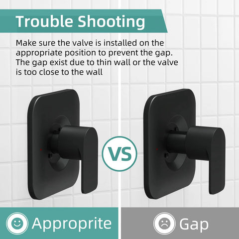 Front view of two matte black shower faucet trim handles with square backplates mounted on a tiled wall