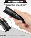Hand holding Red Light Flashlight With Red Lens Filter, Single Mode LED Torch For Night Observing Astronomy Aviation Beach Safety.