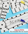 64 Piece Black And White Scribble Classroom Name Plates Set With Self Adhesive Desk Labels showing writable surface and pen
