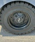 Heavy Duty Commercial Ride On Industrial Sweeper For Warehouses And Factories. Tire designed for rough surfaces and tough debris.