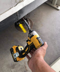 Hand using drill with Three Eighths Inch Socket Adapter For Pop Up Camper Crank Handles Replacement Chrome Plated