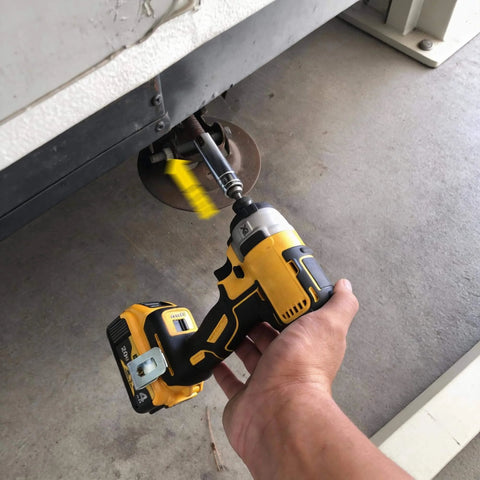 Hand using drill with Three Eighths Inch Socket Adapter For Pop Up Camper Crank Handles Replacement Chrome Plated