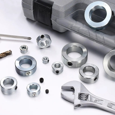 Assorted sizes of zinc-plated shaft collars with tools; Six Piece Set Screw Shaft Collars For Three Quarter Inch Bore Hollow Style Zinc Plated Carbon Steel With One And A Quarter Inch Outside Diameter And Nine Sixteenth Inch Width Clamp For Axle Positioning Heavy Duty Lightweight Pack Of Six.