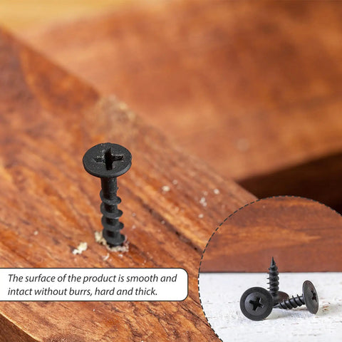 Tough As Nails Carbon Steel Black Pan Head Phillips Self Tapping Screw used on wood surface with detailed close-up