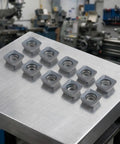 10 Pack Carbide Turning Inserts For Steel Cast Iron And Non Ferrous Metals Machining On Lathe And Milling Tools Holding With Easy Wrench Replacement For A Tough Workhorse With Long Tool Life And Lower Tooling Costs, 10 silver inserts on metal table