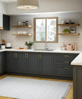Brushed Brass Square Cabinet Handles With 6 1 4 Inch Center To Center Spacing Heavy Duty Kitchen Drawer Pulls And Vanity Hardware on dark cabinets in a modern kitchen.