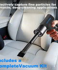 Hand using Two In One Air Duster And Vacuum Beast With 130000 RPM Brushless Motor on car seat for cleaning
