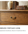 Six Pack Vintage Bail Drawer Pulls In Antique Brass, 3-3/8 Inch Hole Centers on rustic wooden dresser