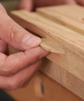 Inserting Beechwood Joining Biscuits Variety Pack No 0 10 20 into wooden joint for strong durable joinery in woodworking project.