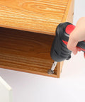 Person installing a 50 Pack Clear Cabinet Bumpers With Screws Dead Silent Rubber Door Stops on wooden furniture.