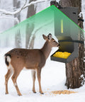 Heavy Duty Metal Deer Feeder With Gravity Dispenser For Protein And Corn Feed Built Like A Tank Rock Solid Galvanized Steel in snowy setting with deer feeding.
