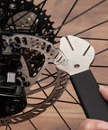 Rotor Truing Fork 2 In 1 Bike Rotor Tool And Hydraulic Piston Press For Bicycle Disc Brakes in use on bike rotor
