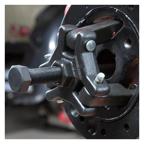 Close-up of Chrysler Harmonic Damper Puller and Balancer Removal Tool Set for Mechanics in use on vehicle engine