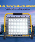 Spot Lighting Portable Rechargeable Led Flood Light 100W 200W 300W 400 with yellow frame and bright white LEDs.