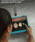 Child engaging with Dope Yet Durable Kids Tablet With A Snappy Eight Inch Hd Display 64 Gb Memory showing educational game.