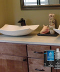 Top Tier Concrete Countertop Sealer Boasting Smooth Matte Finish No Fuss Water Based Application on a kitchen countertop.