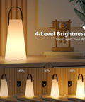 Rechargeable Cordless Outdoor Lanterns with four brightness levels on a table, showcasing IP44 water resistant remote-controlled lighting.