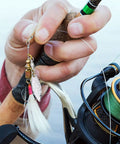 Spinner Blades With Ball Bearing And Spring Pins For Lure Making, Willow Tail Spinner Blades With Swivels, 30 Pcs Set, Durable Iron Construction, Pro Grade Build, Corrosion Resistant, Perfect Fish Attractor For Lure Building. hand holding silver willow spinner blade on fishing rod