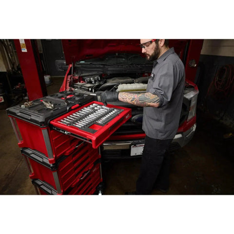 Premium Shop Rig Ready 366 Piece Master Mechanics Hand Tool Set With Heavy Duty 12 Drawer Rolling Cart being used for car repairs.